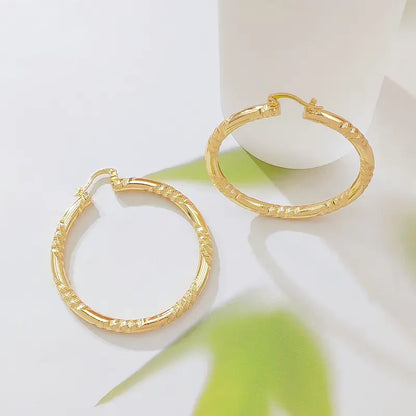 Women's Elegant Twisted Gold Shiny Huggie Earrings - Faceted Diamond-Cut Textured, Lightweight Comfortable Female Costume Jewelry, Earrings for Women for Party & Daily Wear, Gold Shiny Earrings