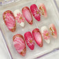 30Pcs Pink Flower Press on Nails Medium Almond Fake Nails Peach Blossom with 3D Rhinestones Pearl Gold Glitter Design Artificial Cute Cat Nails Stick on Nails Spring False Nails for Women Acrylic Nail