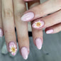 Fall Short Press On Nails Almond, Nude Fake Nails accented with golden glitter and Graceful White Floral Petal Design, Glossy Gel Finish Acrylic Nails, Natural Reusable Glue On Nails for Women