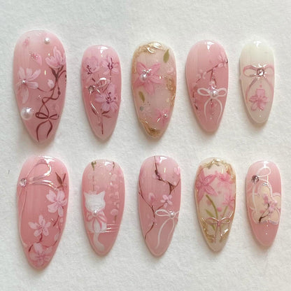 30Pcs Pink Flower Press on Nails Medium Almond Fake Nails Peach Blossom with 3D Rhinestones Pearl Gold Glitter Design Artificial Cute Cat Nails Stick on Nails Spring False Nails for Women Acrylic Nail