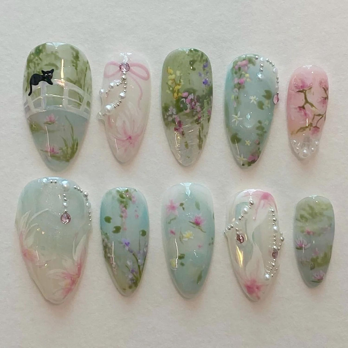 30Pcs Pink Flower Press on Nails Medium Almond Fake Nails Peach Blossom with 3D Rhinestones Pearl Gold Glitter Design Artificial Cute Cat Nails Stick on Nails Spring False Nails for Women Acrylic Nail