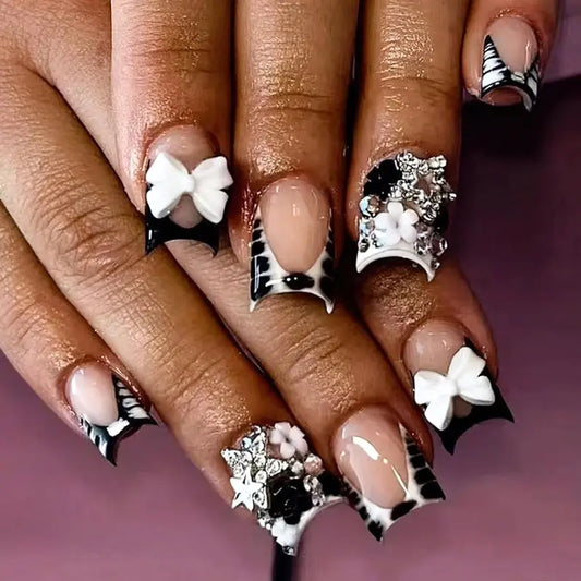 Women's Edgy Multi-Size 24-Piece Chip-Resistant Press-On Decorative Nails Set, Short Square French Tip with Bow Charms, Black White Animal Print, Small Flowers, Silver Star Rhinestones (Cheerleading Accessory)