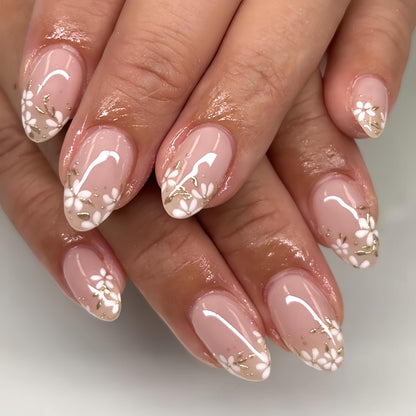 Fall Short Press On Nails Almond, Nude Fake Nails accented with golden glitter and Graceful White Floral Petal Design, Glossy Gel Finish Acrylic Nails, Natural Reusable Glue On Nails for Women